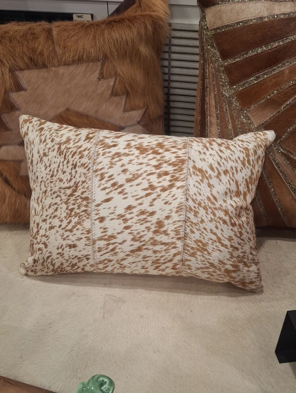 Brown and White Cowhide Accent Pillow by